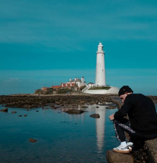 Bored man while traveling - is it weird to travel alone